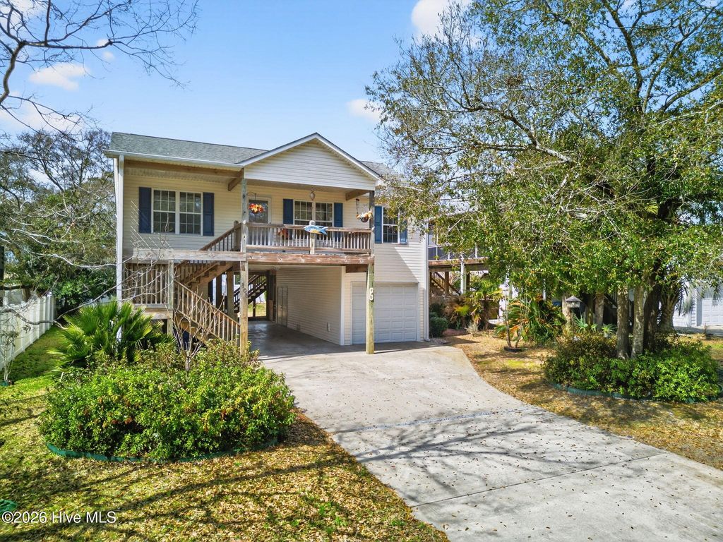 Photo of 103 SE 34th Street, Oak Island, NC 28465 (MLS # 100558532)
