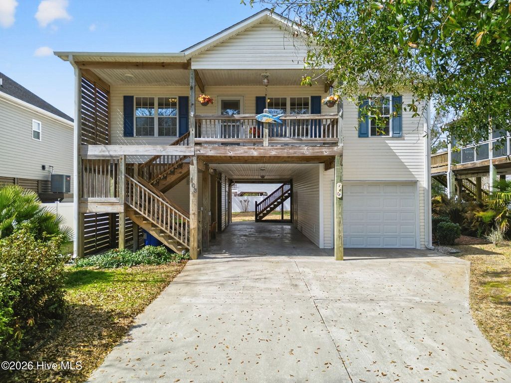 Photo of 103 SE 34th Street, Oak Island, NC 28465 (MLS # 100558532)
