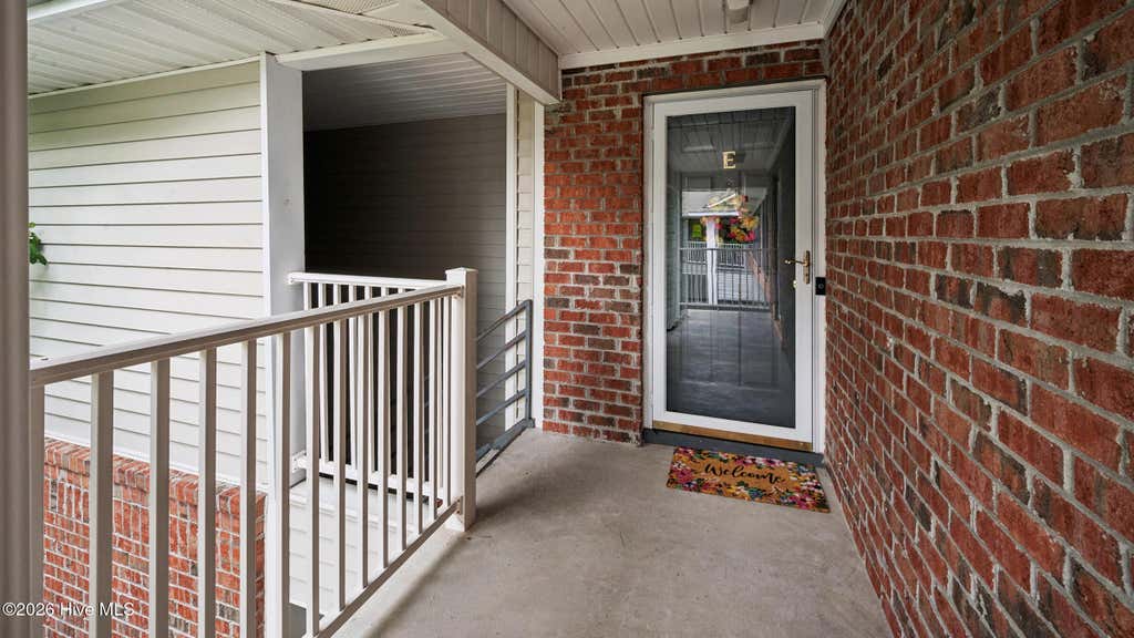 Photo of 2209 Locksley Woods Drive #E, Greenville, NC 27834 (MLS # 100594752)