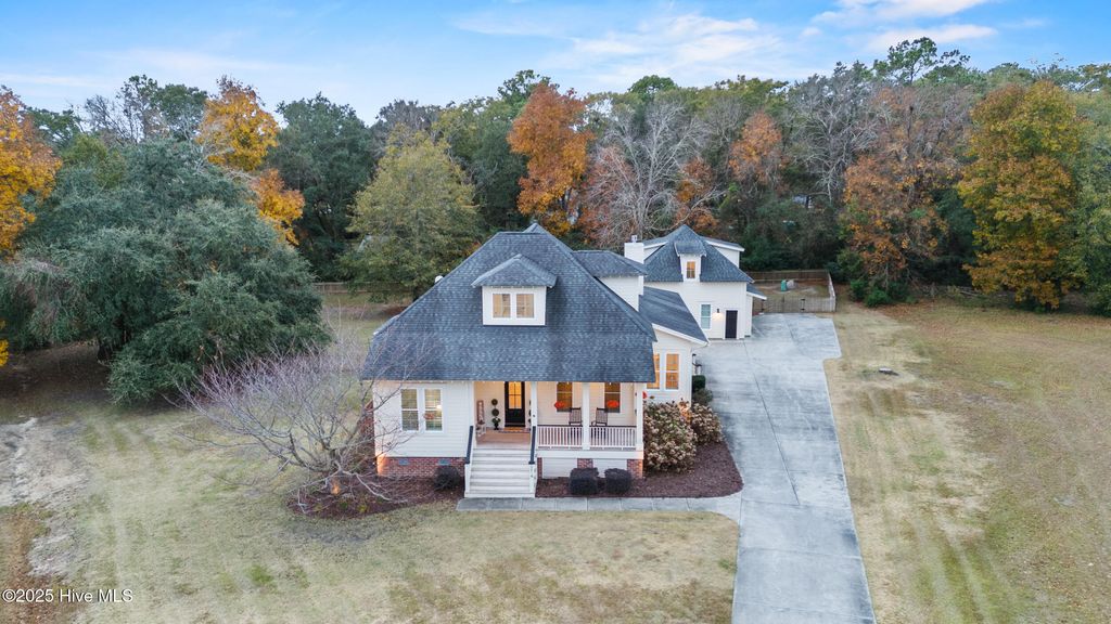 Photo of 214 Salt Marsh Lane, Hampstead, NC 28443 (MLS # 100543217)