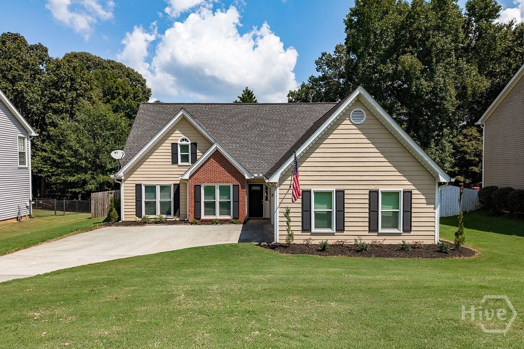 Photo of 5685 Sugar Crossing Drive, Sugar Hill, GA 30518 (MLS # CL364238)