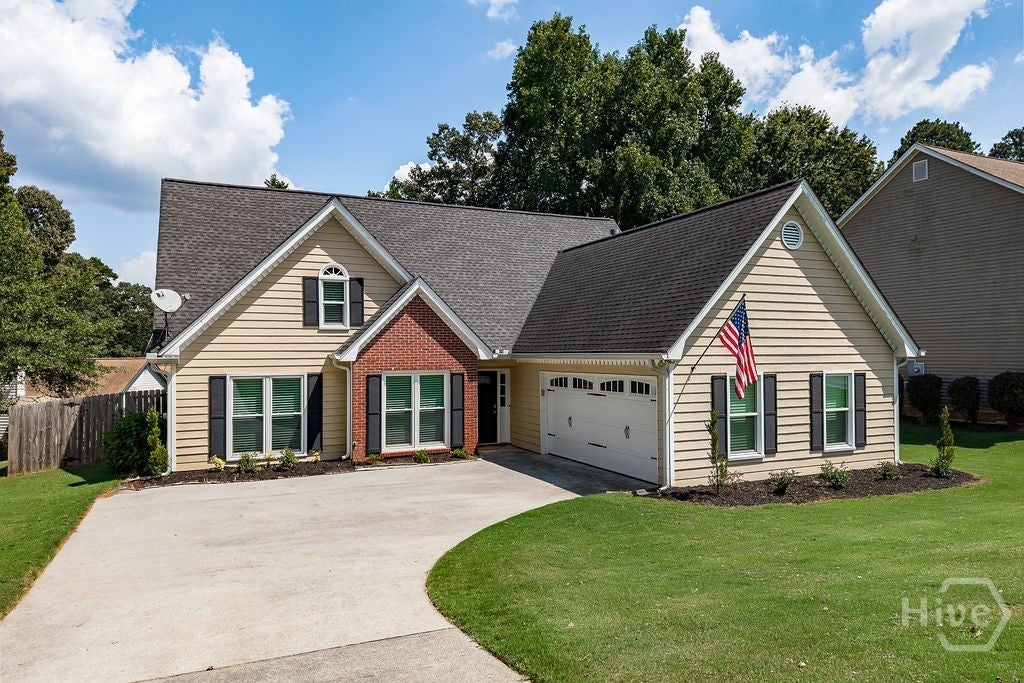 Photo of 5685 Sugar Crossing Drive, Sugar Hill, GA 30518 (MLS # CL364238)