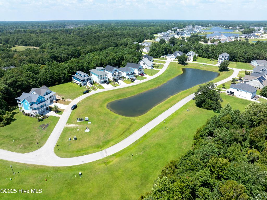 Photo of 621 Tom Nevers Way, Holly Ridge, NC 28445 (MLS # 100437407)