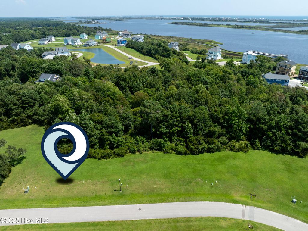 Photo of 621 Tom Nevers Way, Holly Ridge, NC 28445 (MLS # 100437407)