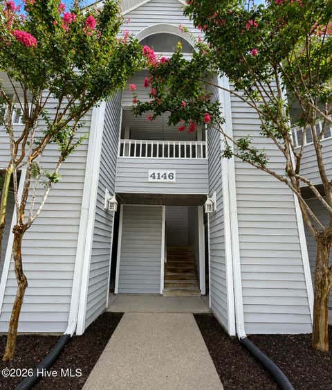 Photo of 4146 Breezewood Drive #Apt 202, Wilmington, NC 28412 (MLS # 100594466)