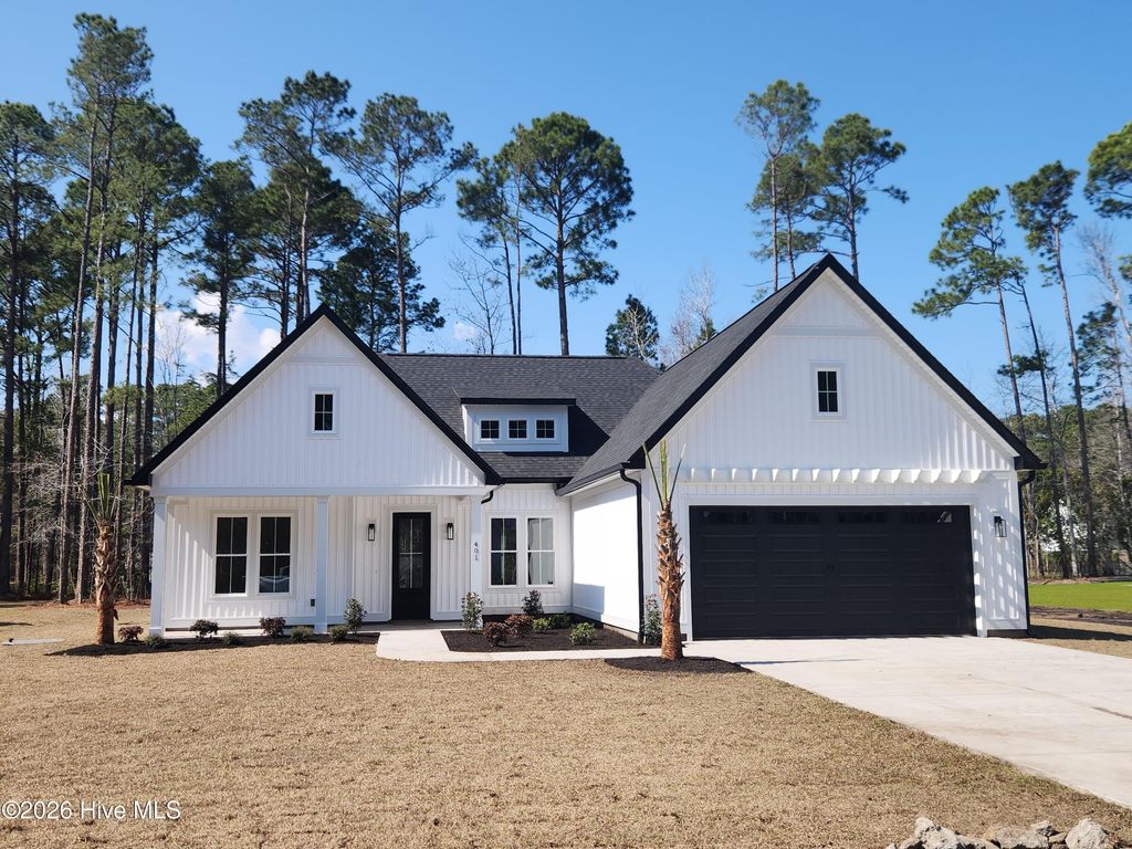Photo of 401 Baypark Drive NW, Calabash, NC 28467 (MLS # 100559285)