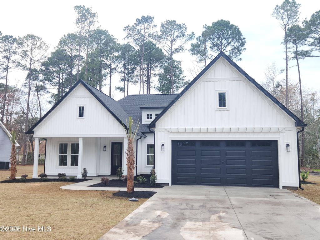 Photo of 401 Baypark Drive NW, Calabash, NC 28467 (MLS # 100559285)