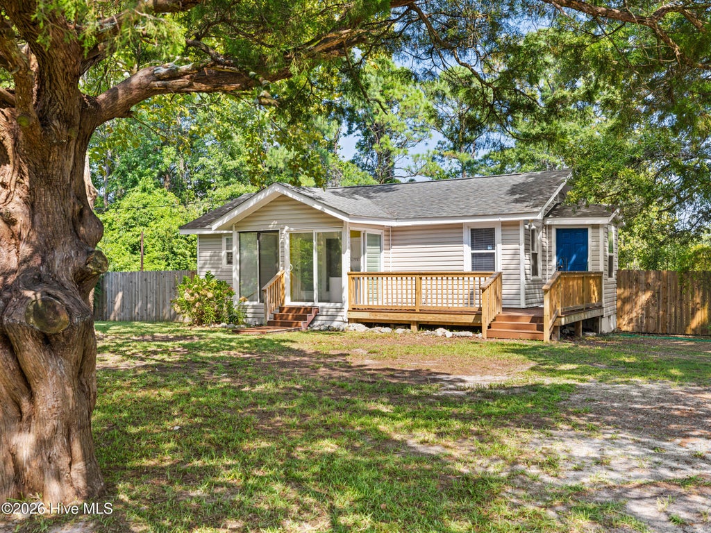 Photo of 682 E Ocean Road, Holly Ridge, NC 28445 (MLS # 100596786)