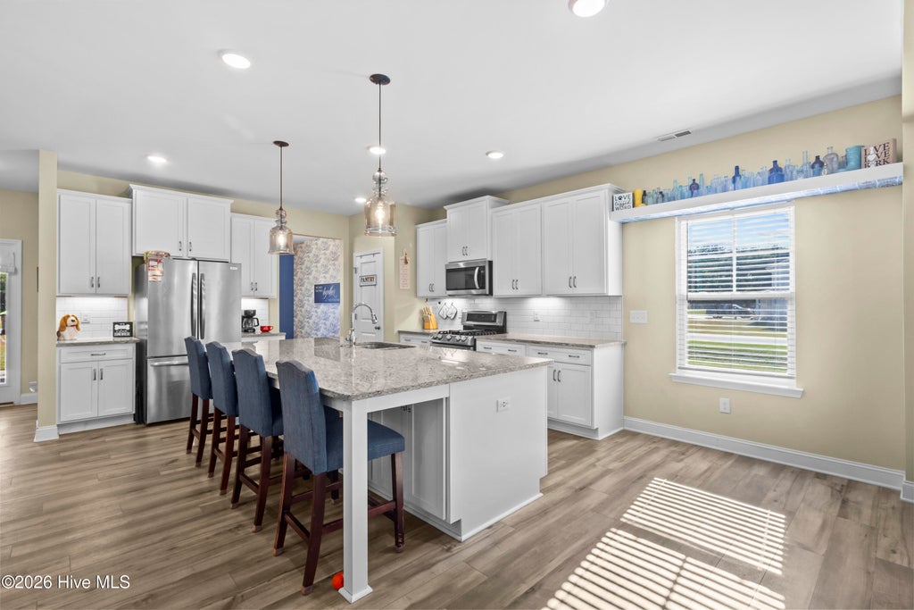 Photo of 114 Persimmon Drive, New Bern, NC 28562 (MLS # 100613436)