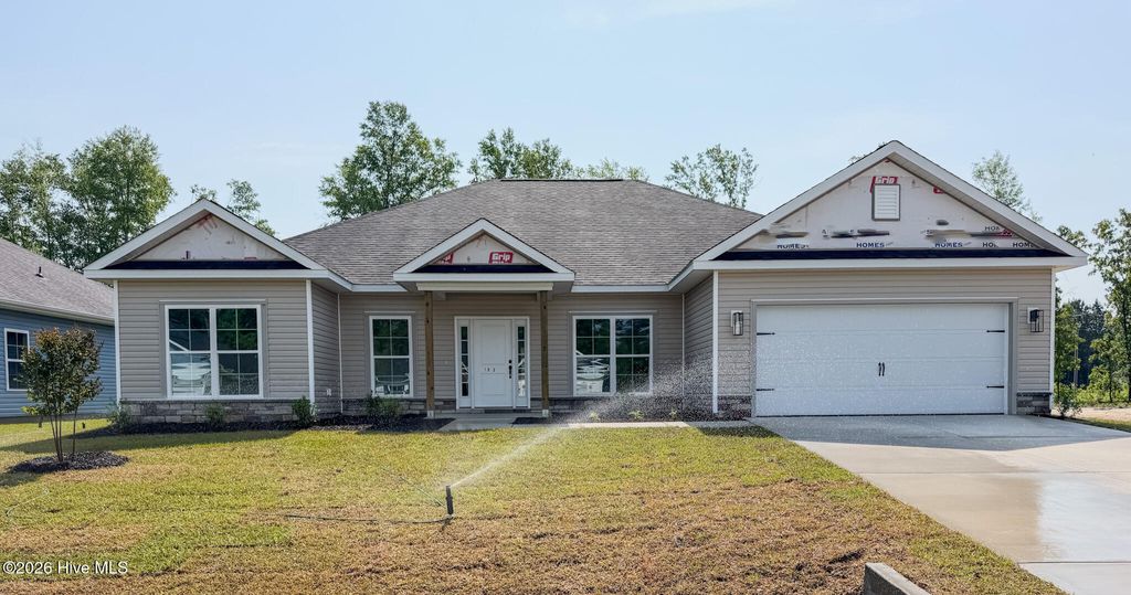 Photo of 1033 Wood Creek Road NE, Leland, NC 28451 (MLS # 100562630)