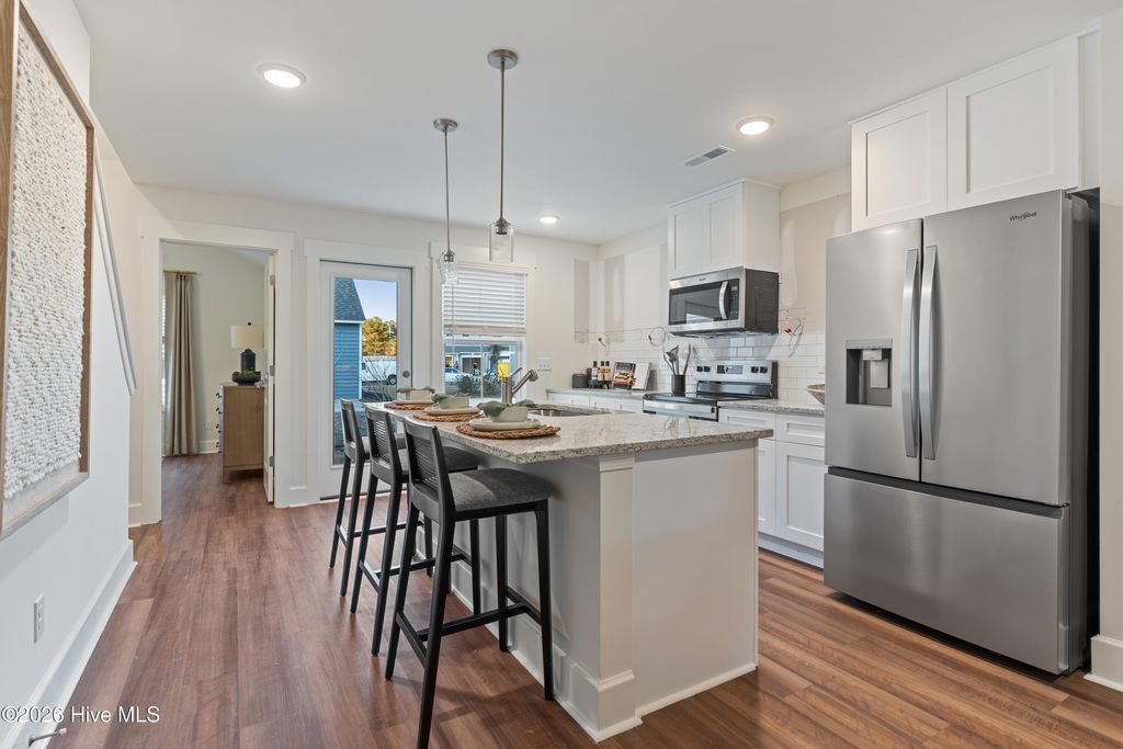 Photo of 69 W Pioneer Way #106, Hampstead, NC 28443 (MLS # 100556228)