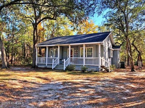 Photo of 114 NW 23rd Street, Oak Island, NC 28465 (MLS # 100557287)