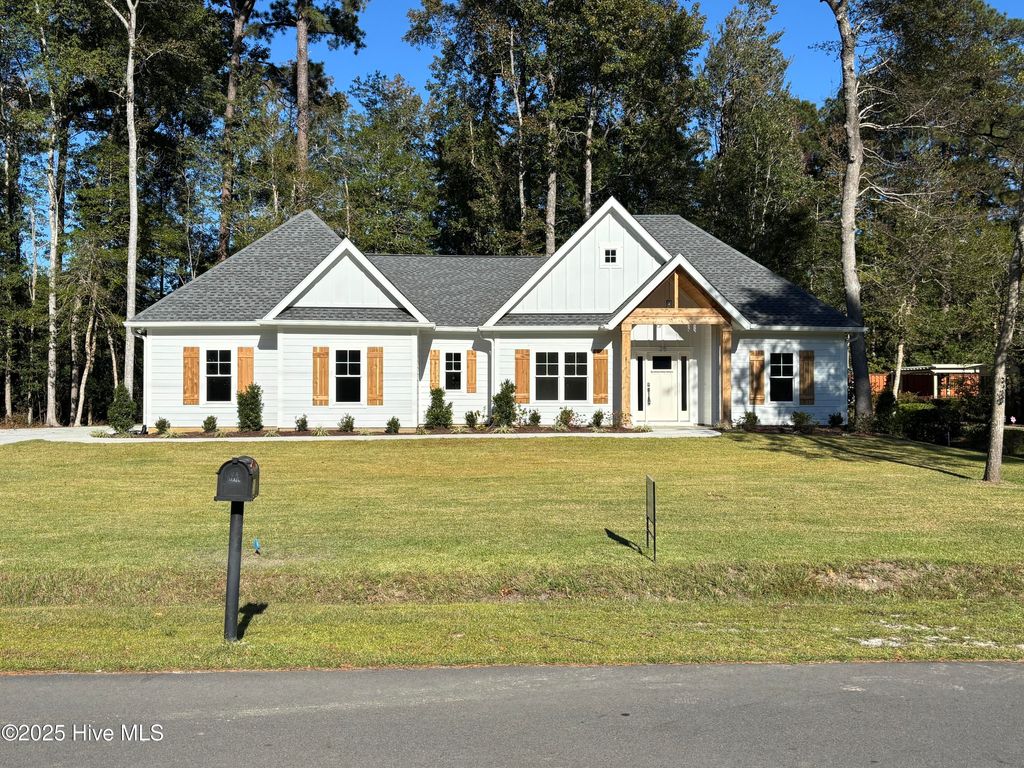 Photo of 25 Pinewood Drive, Carolina Shores, NC 28467 (MLS # 100502261)