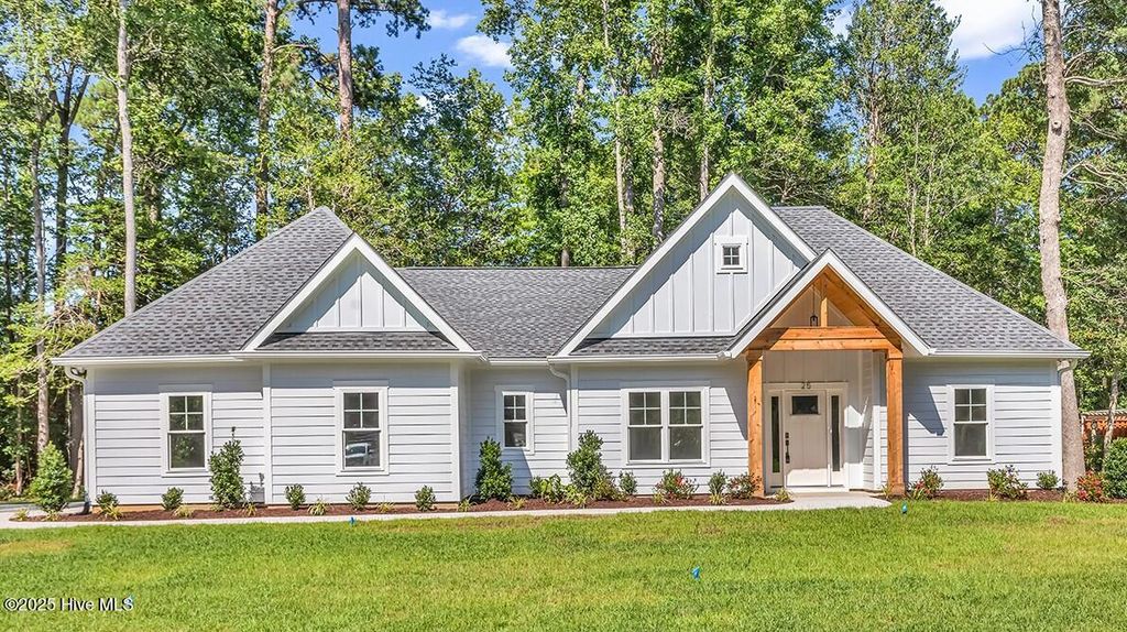 Photo of 25 Pinewood Drive, Carolina Shores, NC 28467 (MLS # 100502261)