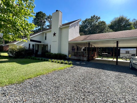 Photo of 12040 Mccormick Drive, Maxton, NC 28364 (MLS # 100580068)