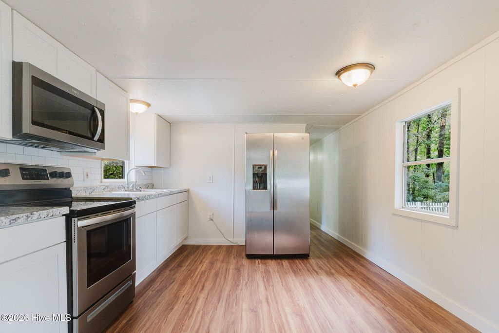 Photo of 1681 Tuna Drive SW, Shallotte, NC 28470 (MLS # 100589601)