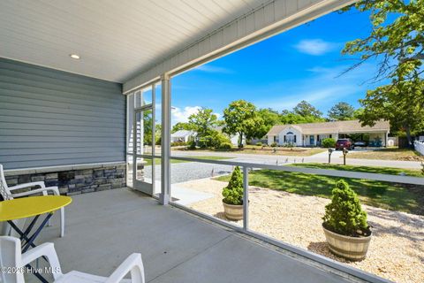 Tiny photo for 121 NW 12th Street, Oak Island, NC 28465 (MLS # 100569272)
