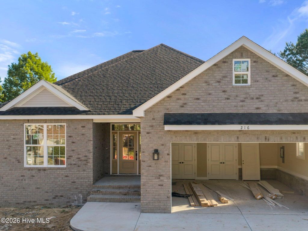 Photo of 216 Ravennaside Drive NW, Calabash, NC 28467 (MLS # 100577037)