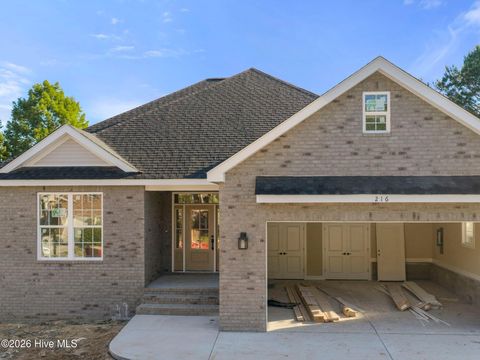 Photo of 216 Ravennaside Drive NW, Calabash, NC 28467 (MLS # 100577037)