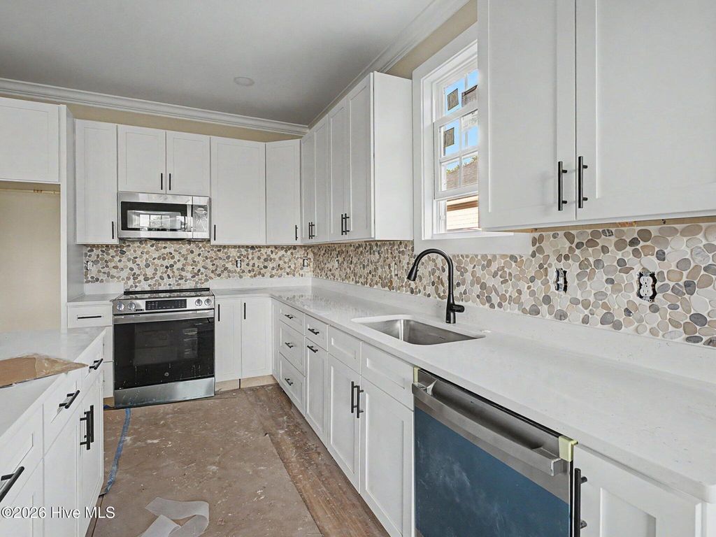 Photo of 216 Ravennaside Drive NW, Calabash, NC 28467 (MLS # 100577037)