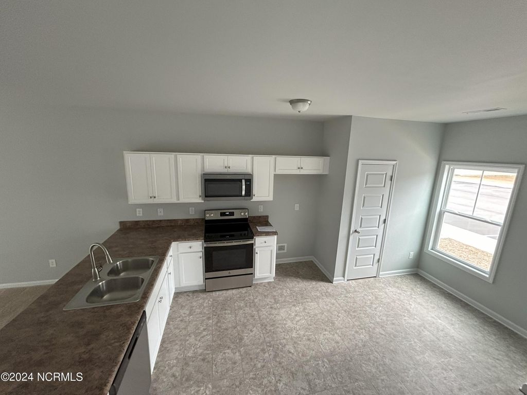 Photo of 174 Buckhorn Avenue, Holly Ridge, NC 28445 (MLS # 100579878)