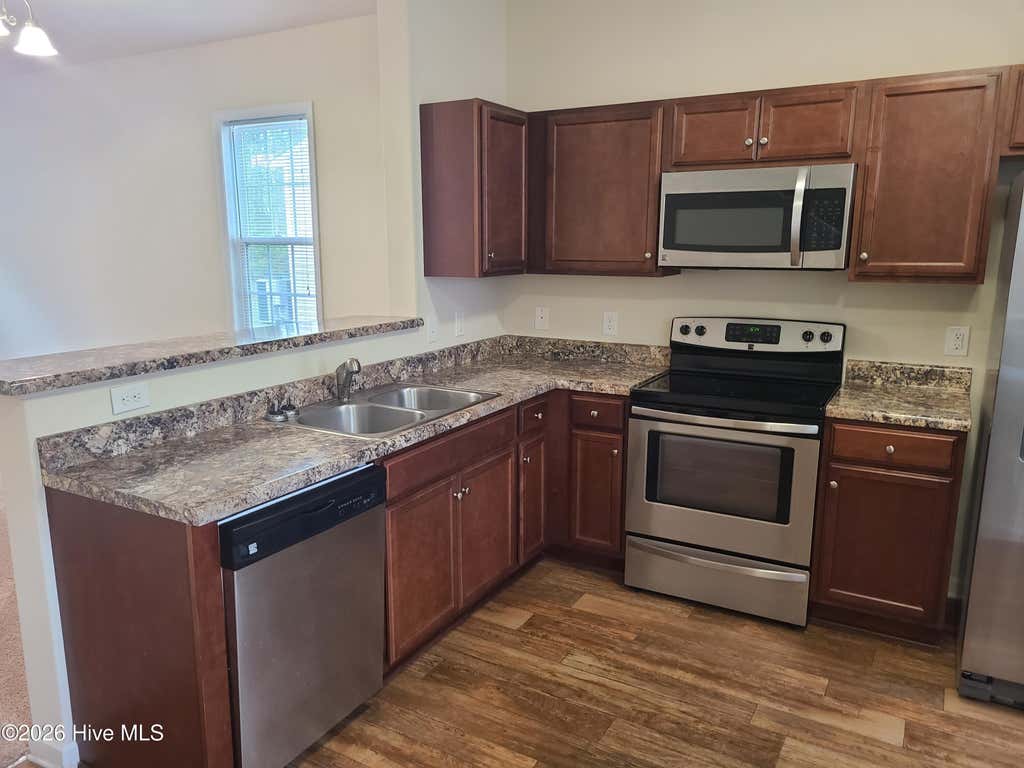 Photo of 123 Beacon Woods Drive, Holly Ridge, NC 28445 (MLS # 100579520)