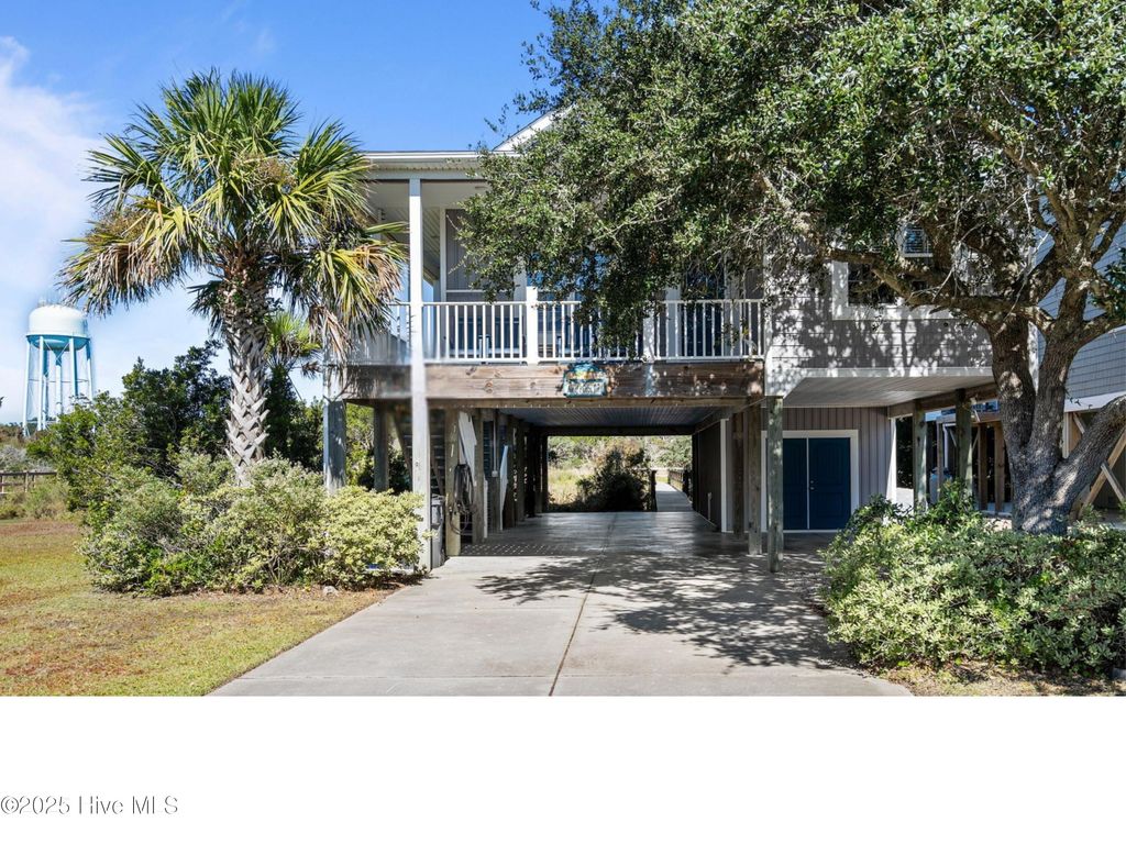 Photo of 3208 E Pelican Drive, Oak Island, NC 28465 (MLS # 100537497)