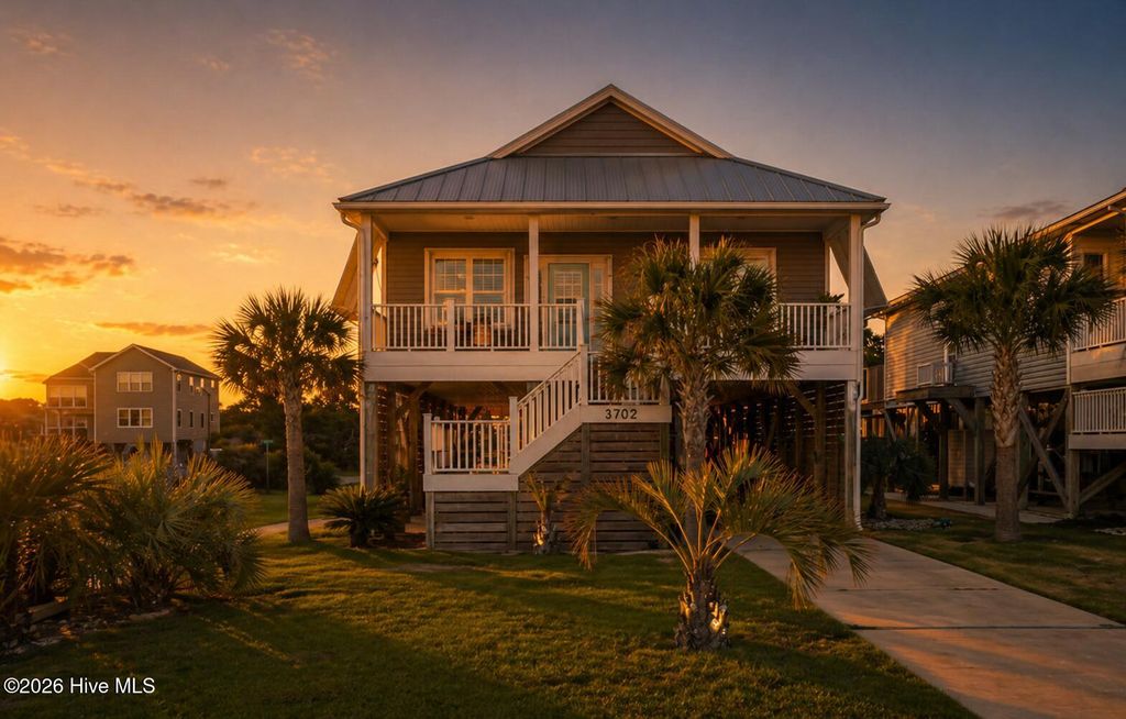 Photo of 3702 E Dolphin Drive, Oak Island, NC 28465 (MLS # 100570280)