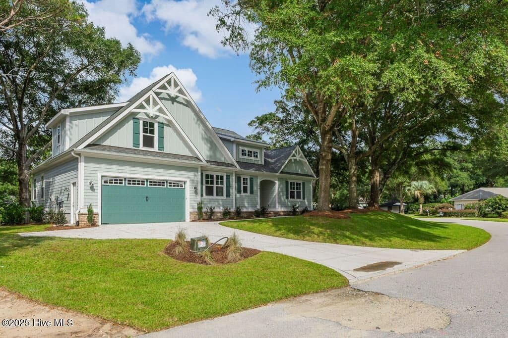 Photo of 394 Sea Trail Drive W, Sunset Beach, NC 28468 (MLS # 100528921)