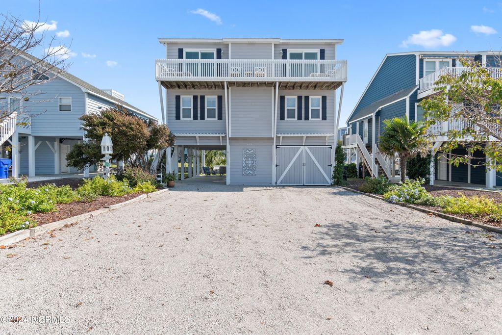 Photo of 415 Sailfish Street, Sunset Beach, NC 28468 (MLS # 100566016)