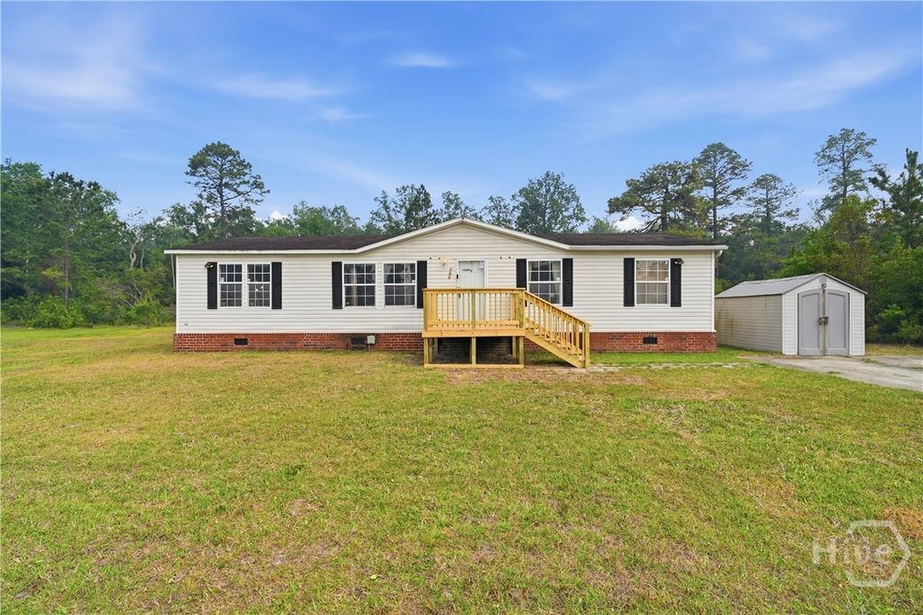 Photo of 135 Tupelo Loop NE, Ludowici, GA 31316 (MLS # SA354399)