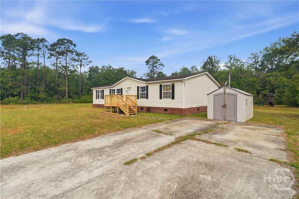 Photo of 135 Tupelo Loop NE, Ludowici, GA 31316 (MLS # SA354399)