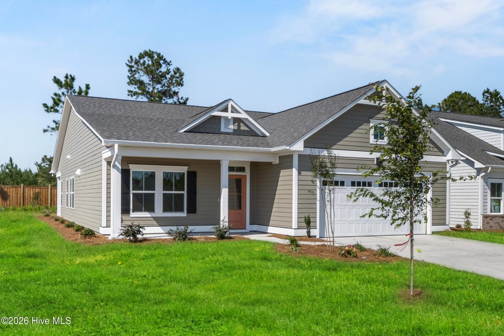 Photo of 7096 Marsh Shore Point #148, Leland, NC 28451 (MLS # 100611738)