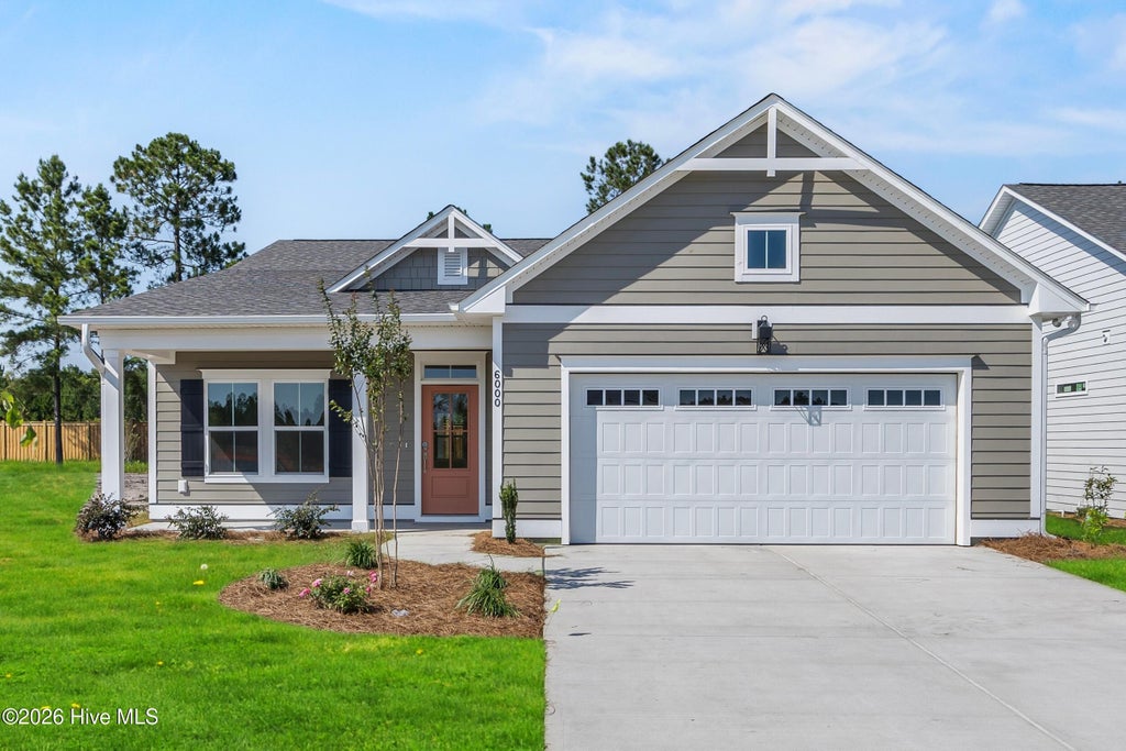 Photo of 7096 Marsh Shore Point #148, Leland, NC 28451 (MLS # 100611738)