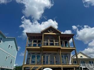 Photo of 3206 E Beach Drive, Oak Island, NC 28465 (MLS # 100600709)