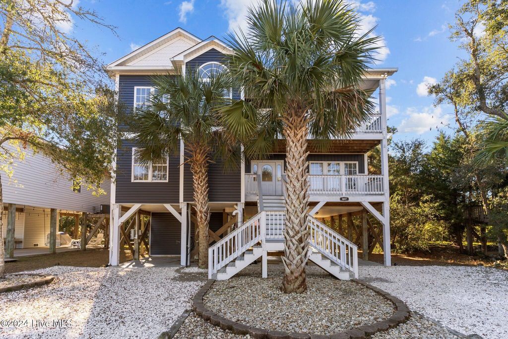 Photo of 1617 E Pelican Drive, Oak Island, NC 28465 (MLS # 100480752)