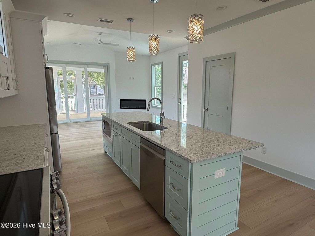 Photo of 98 SE 43rd Street, Oak Island, NC 28465 (MLS # 100557315)