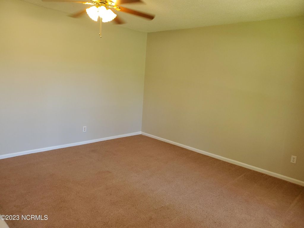 Photo of 126 Tanglewood Drive, Jacksonville, NC 28540 (MLS # 100568111)