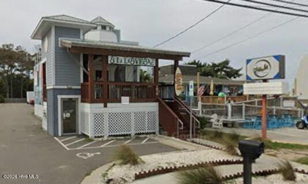 Photo of 1012 Lake Park Boulevard S, Carolina Beach, NC 28428 (MLS # 100553934)