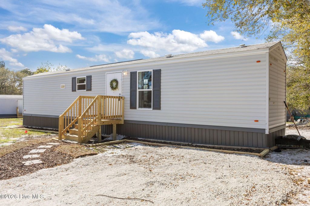 Photo of 111 Woodpecker Road, Holly Ridge, NC 28445 (MLS # 100565436)