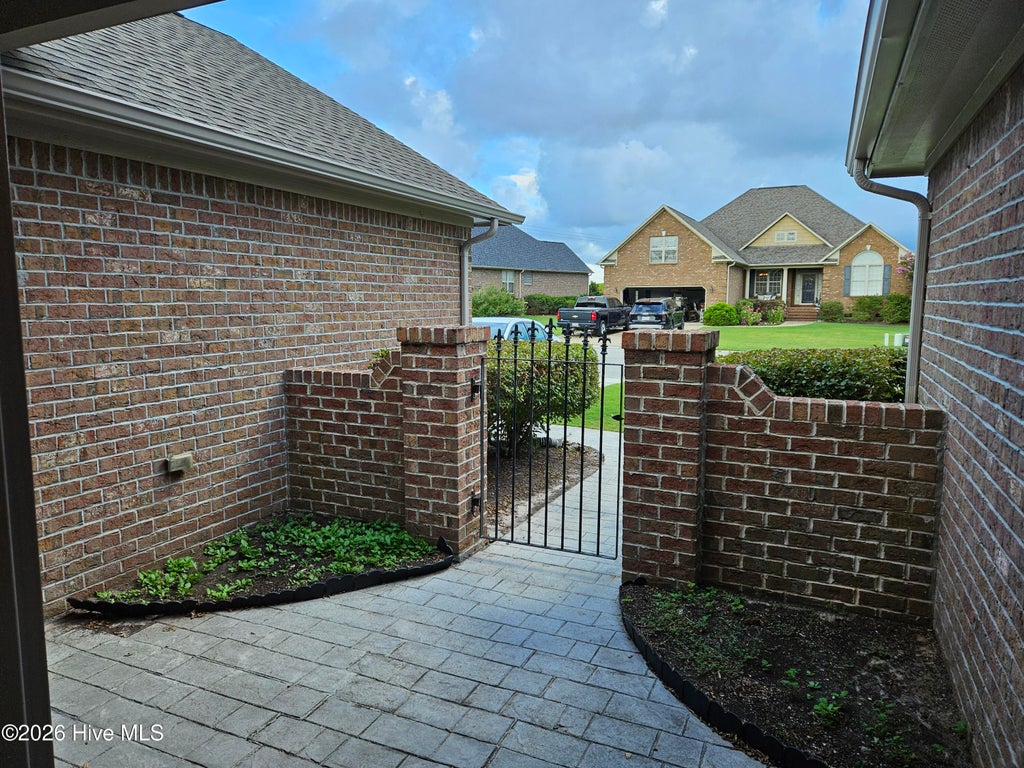 Photo of 721 Highlands Drive, Hampstead, NC 28443 (MLS # 100612962)