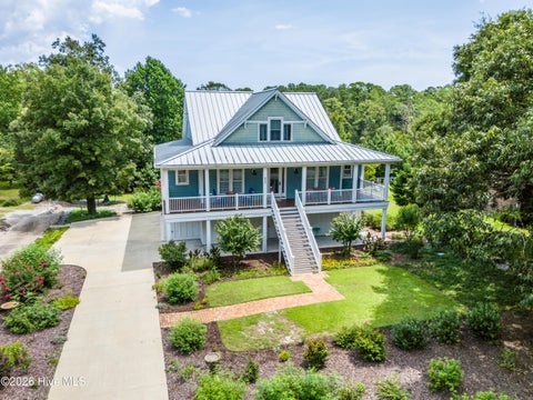 Photo of 630 Ravenswood Road, Hampstead, NC 28443 (MLS # 100596457)