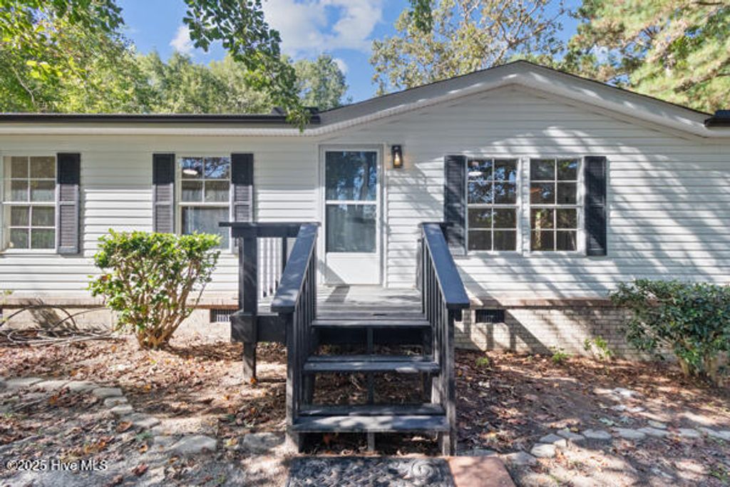 Photo of 1320 Sloop Point Road, Hampstead, NC 28443 (MLS # 100535118)