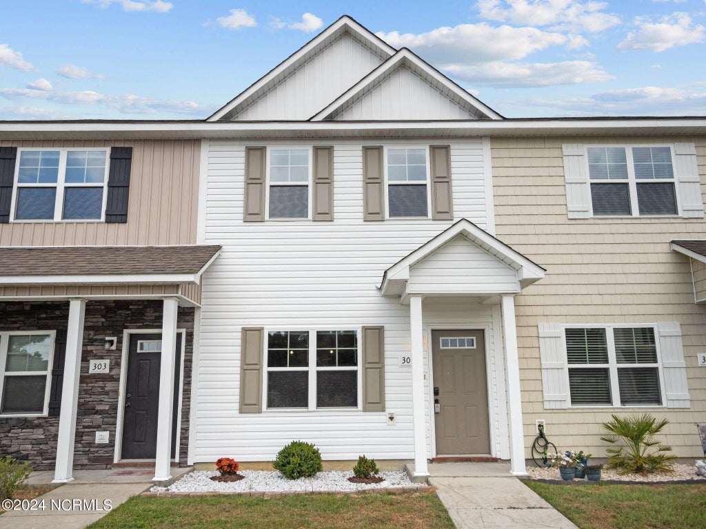 Photo of 305 Justice Farm Drive, Sneads Ferry, NC 28460 (MLS # 100606929)