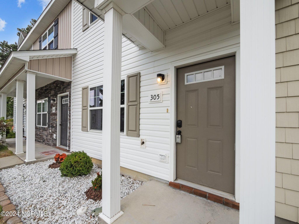 Photo of 305 Justice Farm Drive, Sneads Ferry, NC 28460 (MLS # 100606929)