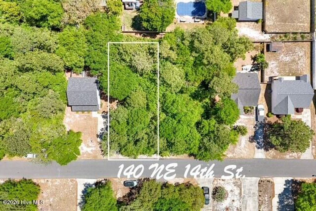 Photo of 140 NE 14th Street, Oak Island, NC 28465 (MLS # 100568091)