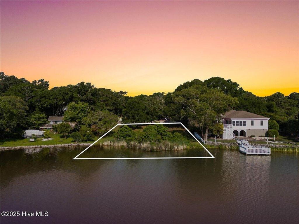 Photo of 621 Lake Shore Drive, Sunset Beach, NC 28468 (MLS # 100507999)