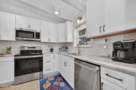 Tiny photo for 105 SE 76th Street, Oak Island, NC 28465 (MLS # 100585033)