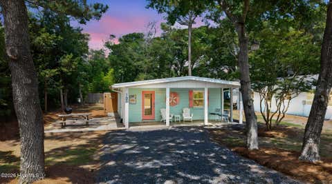Photo of 105 SE 76th Street, Oak Island, NC 28465 (MLS # 100585033)