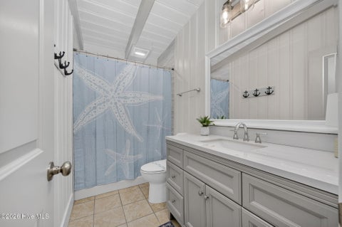 Tiny photo for 105 SE 76th Street, Oak Island, NC 28465 (MLS # 100585033)